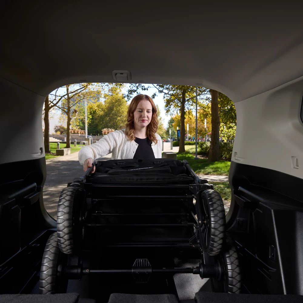 Wonderfold W4 Luxe Pro Quad Stroller Wagon Black (9) Wonderfold W4 Luxe Pro Quad Stroller Wagon black in vehicle